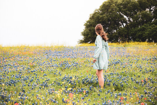 girl in a field of flowers