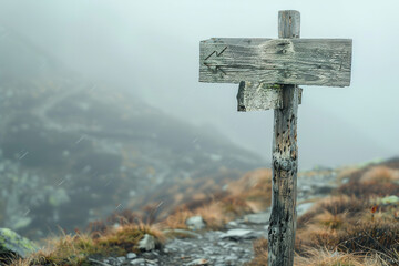 Misty mountain trail with a rustic wooden signpost. - Powered by Adobe