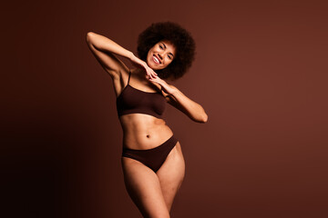 Photo of smiling adorable lady underwear lingerie accept pinple skin emtpy space isolated brown color background