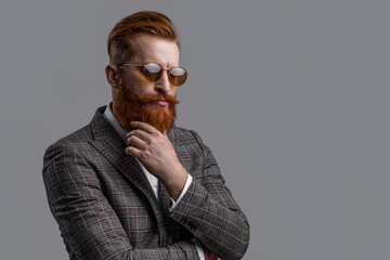 Tuxedo man in menswear isolated on grey. Redhead man in menswear tuxedo. Man wear elegant formal menswear. Elegance of bearded man in formal suit. Copy space. Subtle elegance - 788528646