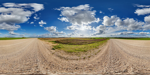 blue sky hdri 360 panorama with awesome clouds on gravel road among fields in spring day in equirectangular full seamless spherical projection, for VR AR content or skydome replacement