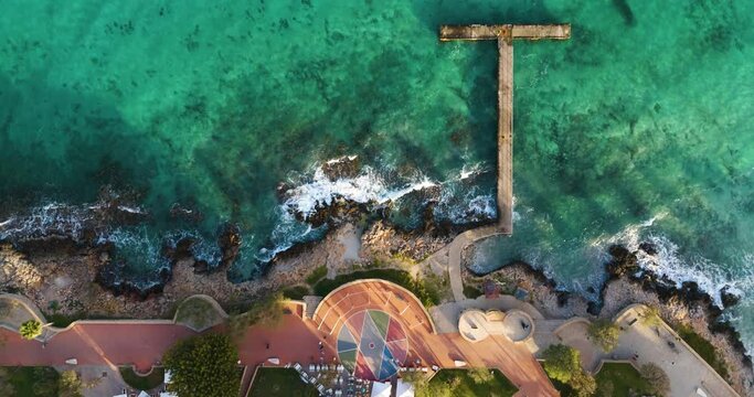 pier of calla millor with tropical water 