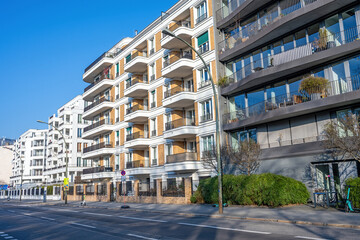 Street with modern apartment buildings seen in Berlin, Germany