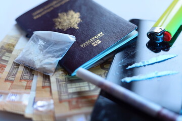 cocaïne , passport and banknotes , international drug traffic concept