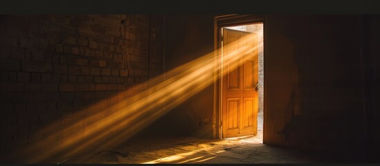 Sunlight creates a pattern of light when it filters through an open door.