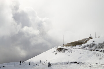 Mountain winter landscape. Mount Grappa war memorial building view