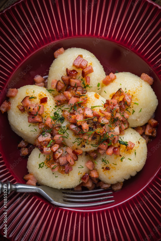 Sticker potato dumplings with bacon.