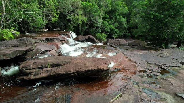 Beautiful video of a waterfall in a lush forest, showcasing natural beauty Phu Quoc Vietnam Khu du lich sinh thai Suoi Da Ban