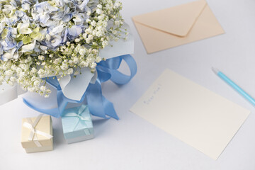 Greeting card and bouquet of flowers. Congratulations on the holiday