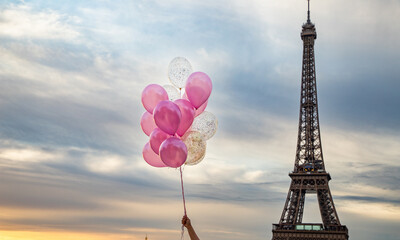 pink and red balloons in front of Eiffel tower, Paris, city of love