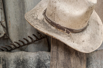 Close up of a dusty farmer’s hat.
Rural composition of an abandoned hat.

