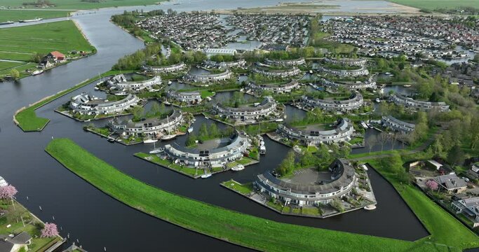 aerial view of a modern residential area in a watery surrounding