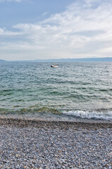 Lake Ohrid, North Macedonia, April 13 2024. Mountain range and peninsula in distance. Ohrid Lake,...