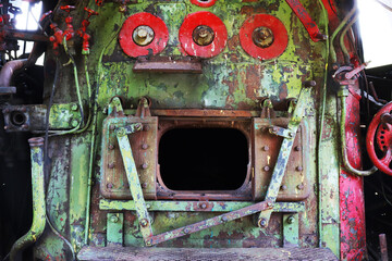 Open firebox door of a retro locomotive.