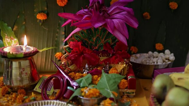 holy hindu god worship with flowers at durga pooja festival at night from different angle