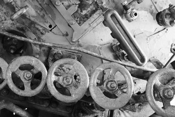 Attachments and controls in the cabin of a steam locomotive.