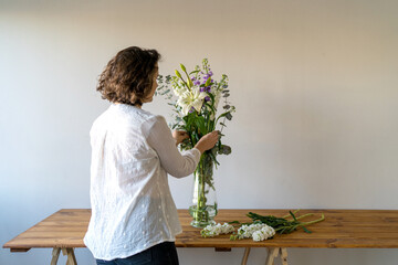 Woman Making A Flower Arrangement