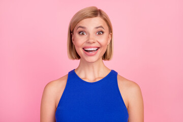 Photo of pretty young woman open mouth cant believe wear blue top isolated on pink color background