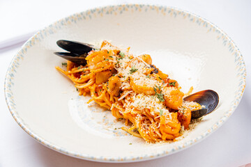 seafood pasta on the white plate