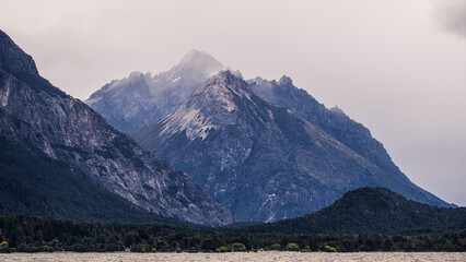 top of Cerro Lopez, rocky mountain in southern Argentina, Bariloche and San Martin de los Andes, Patagonia Route 40. Poplar trees in autumn changing color to yellow-green