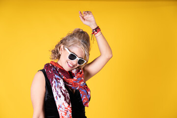 Woman Wearing Sunglasses and Scarf