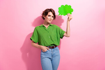 Photo portrait of lovely young lady hold comics paper think cloud wear trendy green garment...