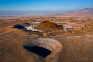 aerial geological crater lake view and pothole