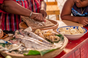Ingredients for Tapado on the kitchen table a traditional dish from Puerto Barrios Izabal. African...
