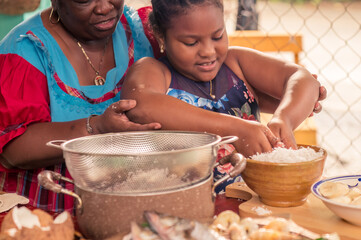 Happy Family In Kitchen. Black Mother And Little grandaughter Preparing lunch together - Loving...