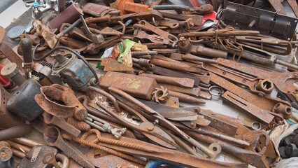 A flea market of old rusty things and tools.