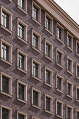 New house. Brick wall. Multi-storey building. Zhitroly quarter. Real estate market. Geometry of...