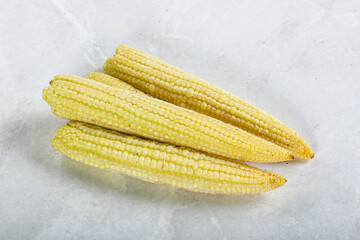 Raw sweet baby corn heap