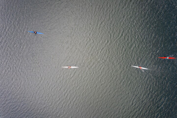 Kayaking top view. Group of kayaks rowing. Aerial view from drone. © Dmitrii Potashkin