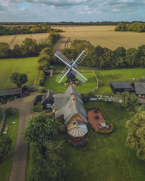 Aerial view of Bourn Windmill and countryside fields, Caxton, Cambridgeshire, England.
