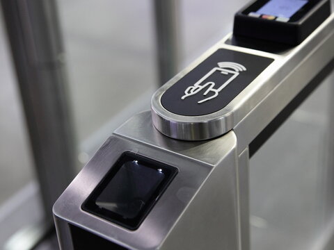 Pass card place and barcode QR code scanner on turnstile - control panel closeup