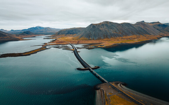 Aerial drone view of Viking Bridge, sword shaped bridge on the Snaefellsnes Peninsula, West Iceland.