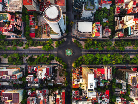 Aerial drone view of Fuente de la Diana and surrounding skyscrapers at Paseo de la Reforma in Mexico City at daytime, Mexico.