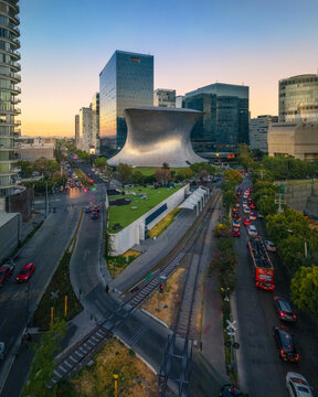 Aerial drone view of Soumaya Museum and train railway in Mexico City at daytime, Mexico.