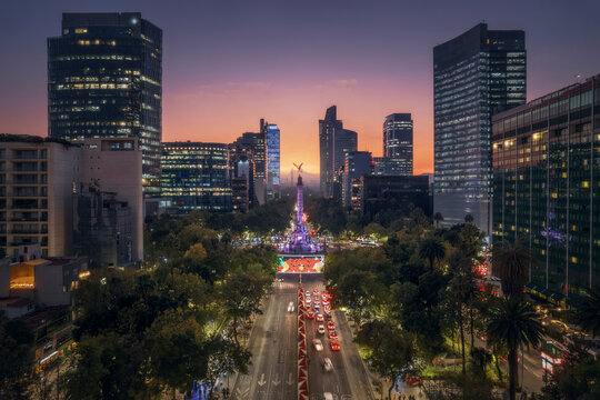 Aerial drone view of skyscrapers at Paseo de la Reforma in Mexico City at sunset, Mexico.
