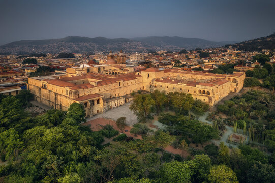 Aerial drone view of Santo Domingo church, an important landmark and botanic garden in Oaxaca at sunrise, Mexico.