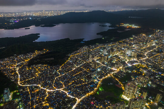 Aerial view of residential district and skyscrapers by Vihar Lake, Bhandup West, Mumbai, India.