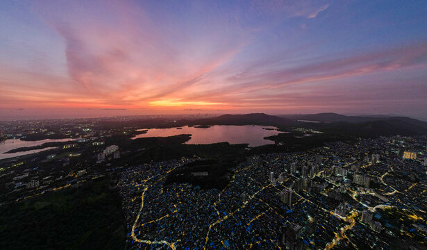 Aerial view of lush woodland surrounding Vihar Lake, Bhandup West, Mumbai, India.