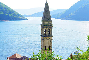 The most famous landmark of the Montenegrin city of Perast - the bell tower of the Church of St....