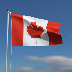 Canada Flag is waving in front of a blue sky with blurred clouds in the background