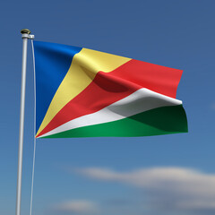 Seychelles Flag is waving in front of a blue sky with blurred clouds in the background