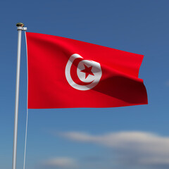 Tunisia Flag is waving in front of a blue sky with blurred clouds in the background