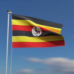 Uganda Flag is waving in front of a blue sky with blurred clouds in the background
