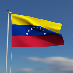Venezuela Flag is waving in front of a blue sky with blurred clouds in the background