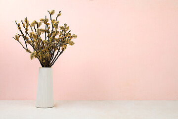 Holiday concept with delicate willow flowers, spring flower arrangement, still life or banner with...
