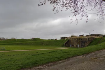 Fototapeten Fortifications and bunkers from the Napoleonic era in the Dutch fort known as Dirks Admiraal in Den Helder on a cloudy, rainy spring day © were